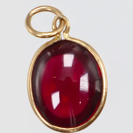 Hänge med rött glas/sten 11x18mm 18K Vikt: 1,3 g