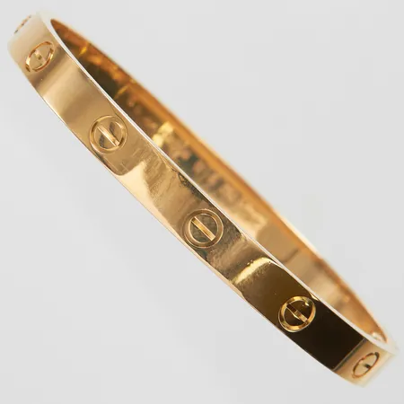 Armband Cartier Love 18K, stl: 18, refnr: CRB6035518, snr: WG5047, skruvmejsel, etui, box, servicepouch, certifikat & inköpskvitto Amsterdam 2013, servicekvitto 2026 Stockholm, inga övriga tillbehör. Vikt: 35,3 g