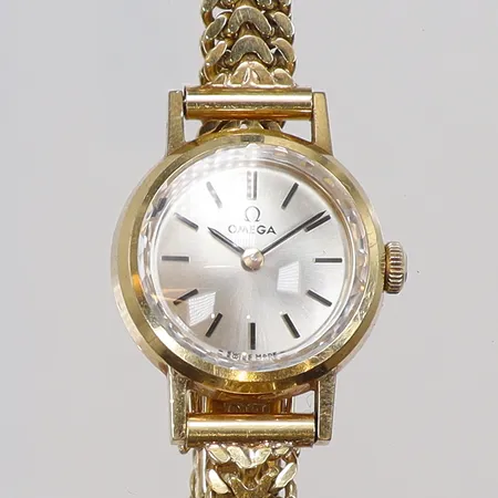 Damur Omega 18K Ø19,5mm manuell uppdragning, helguld, fiskbenslänk med originallåda bruttovikt 21,5g