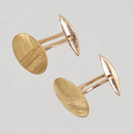 Ett par manschettknappar med mönsterdekor, 18x12mm, repor, 18K Vikt: 7,9 g