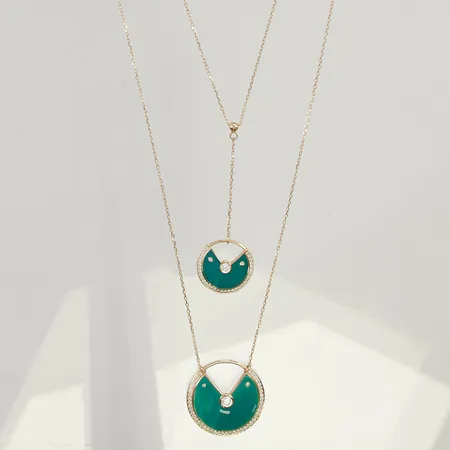 Collier 36/56cm vita stenar 18K 10,2g.