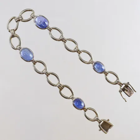Armband med Safirer längd 20cm bredd 8mm slapp låsåtta 18K Vikt: 22,5 g