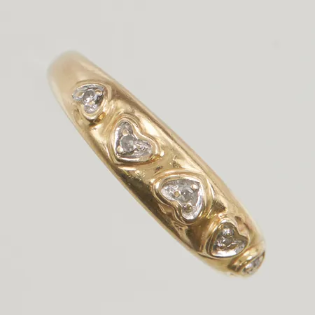 Ring med diamanter 5x ca 0,01ct stl:16 bredd 4mm 18K 2,5g.