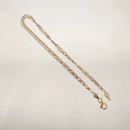 Armband längd 19cm bredd 3mm klämskadad och tvinnad 18k Vikt: 1,9 g