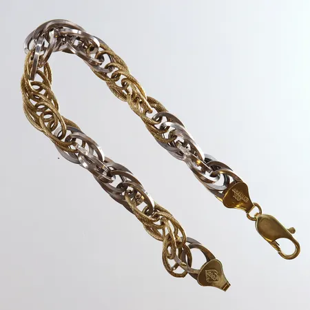 Armband tvåfärgat längd 19,5cm bredd ca 9mm 18K Vikt: 11,1 g