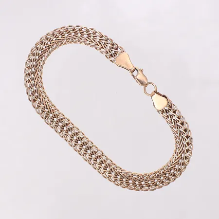 Armband längd 18,5cm, bredd 7-7,2mm, små skevheter, 14K Vikt: 8,9 g