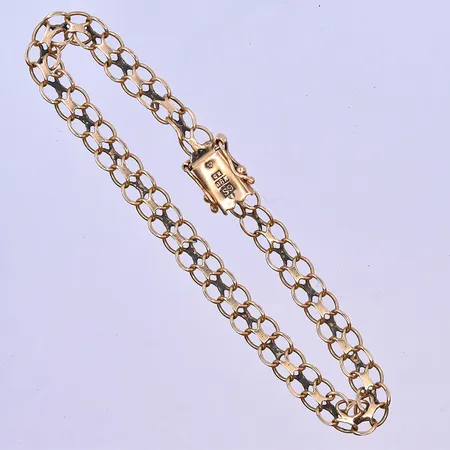 Armband X-länk längd 20 cm bredd 6 mm defekt länk 18K. Vikt: 8,8 g