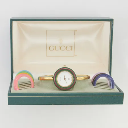 Damur Gucci 27mm doublé, quartz, refnr:1100-L, 3 ringar saknas, 1 något skadad, går ej, batteribyte krävs, originaletui.