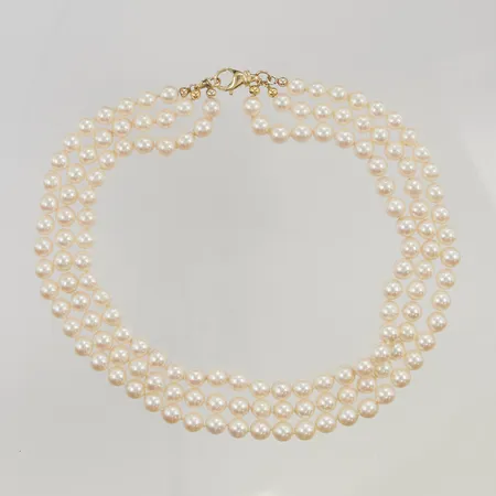 Pärlcollier 3 radigt odlade sötvattenspärlor ca 6-7mm, lås i 18K ca 2g.