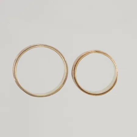 2 Ringar med gravyr 18K 11,5g.