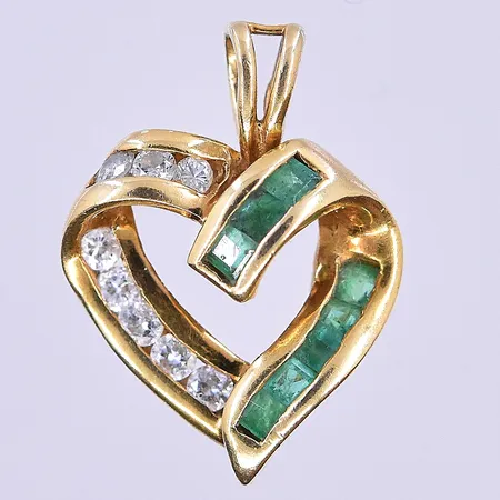 Hänge med diamanter ca 8x0,02ct och smaragd stl: 17x12mm 18K. Vikt: 1,7 g