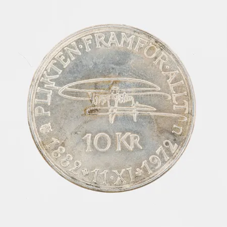 Mynt 10kr Gustaf VI Adolf, Ø32mm, Plikten framför allt, 1882.11.1972, silver 830/1000 Vikt: 18,1 g