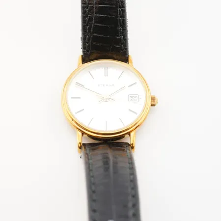 Damur Eterna, quartz, ca 23mm, 18k gravyr bakboett
