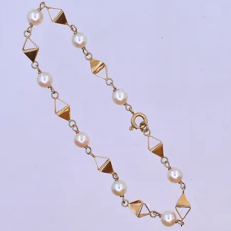 Armband med pärlor längd 19cm bredd 5mm 18K. Vikt: 4,6 g