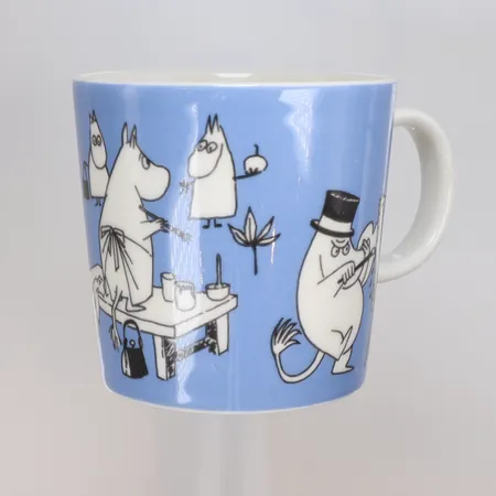 Muminmugg "Mugg Blå"/ "Målande Mumin" Arabia Finland, porslin producerad 1990-1996, höjd 8 cm, smärre slitage