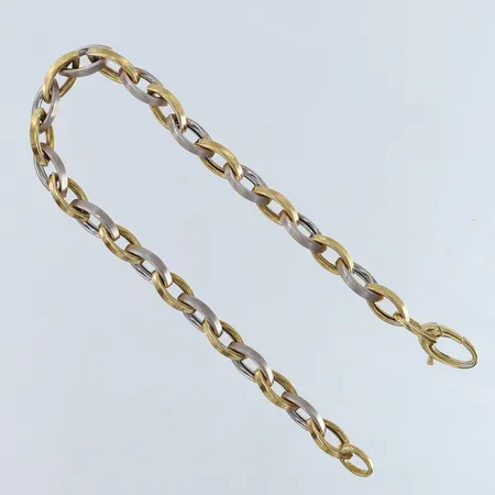 Armband oval ärtlänk längd 18,5cm bredd 5mm tvåfärgat 18K.  Vikt: 7,2 g