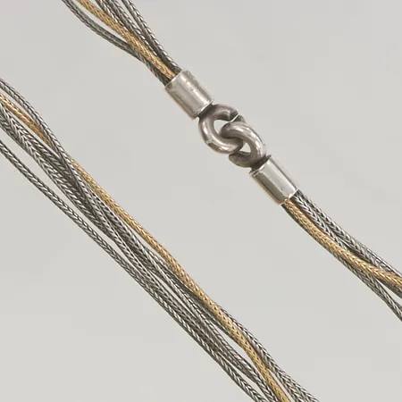 Collier 6-radigt, ca 40cm, en kedja i 18K (ca 5g), 925/1000 Silver totalvikt 29,1g.
