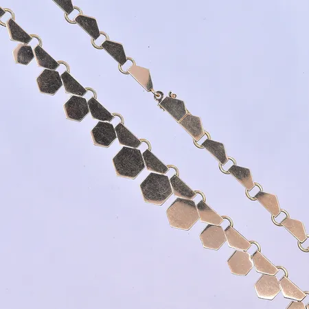Collier längd 40 cm bredd 5-12mm 18K. Vikt: 18,9 g