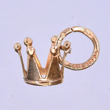 Hänge krona stl: 11x6 mm 18K. Vikt: 0,3 g på auktion i Borlänge hos Pantbanken Sverige
