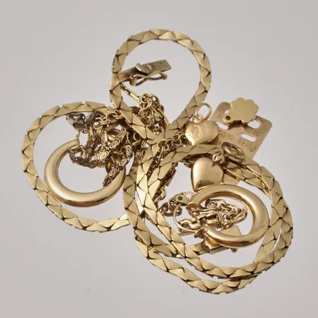 Diverse defekt guld, 18K, vikt 23,67g.