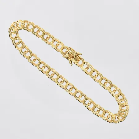 Armband Bismarck längd 19½ cm, bredd 5 mm, 18K. Vikt: 13,4 g