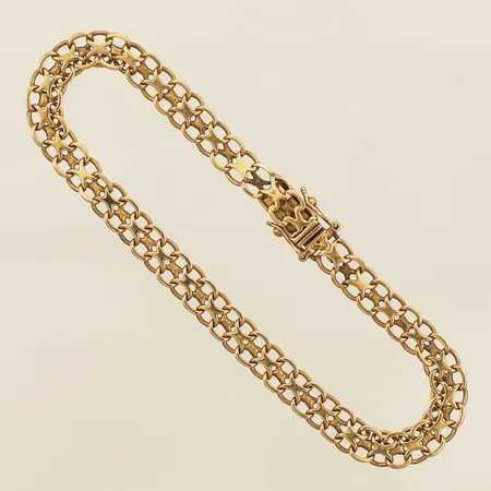 Armband X-länk längd 19cm bredd 5,7mm ojämna länkbitar 18K Vikt: 8,2 g