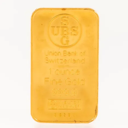 Guldtacka UBS Switzerland serienr: 26290, bruten plombering, 1 ounce finguld 999,9/1000 24K 31,1g.