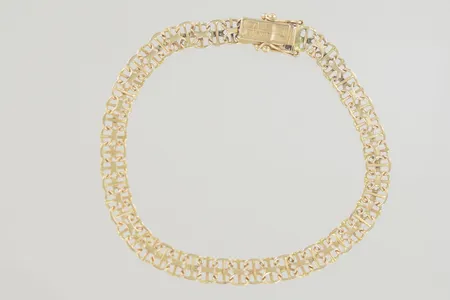 Armband längd 18,5 cm, bredd 6 mm, 18K   Vikt: 8,2 g
