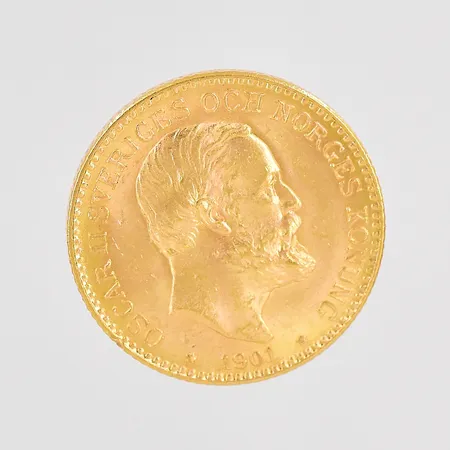 Mynt Oscar II Sveriges och Norges Konung 10 Kronor Brödrafolkens Väl år 1901 Ø18mm 21,6K Vikt: 4,5 g på auktion i Västerås hos Pantbanken Sverige