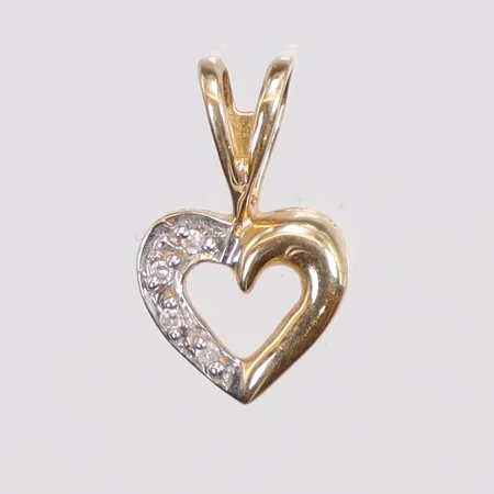 Hänge hjärta tvåfärgad med diamanter 4xca0,005ct 7x12mm inklusive hängöglan GHA 18K Vikt: 0,6 g på auktion i Göteborg Mölndal hos Pantbanken Sverige