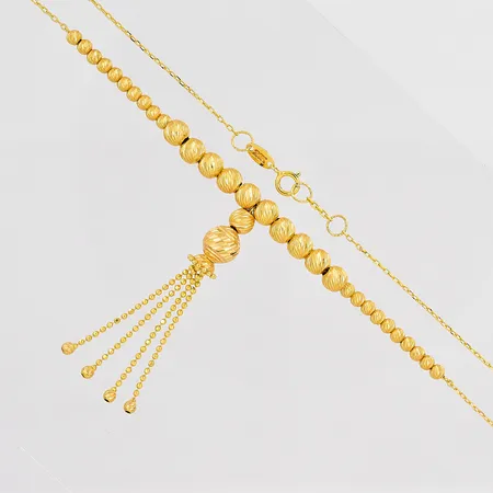 Collier längd 51cm kulor Ø 3-7mm 21K Vikt: 6 g på auktion i Västerås hos Pantbanken Sverige