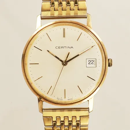Herrur Certina guld quartz Ø33mm länk i gulmetall och stål gravyr 14K på boetten repig batteribyte krävs.