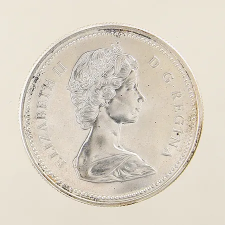Mynt Dollar Elizabeth II Canada 1873-1973 Ø36,2mm etui silver 500/1000 Vikt: 23,4 g på auktion i Solna hos Pantbanken Sverige
