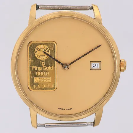 Herrur guldtacka 999/1000 1g Swiss Volksbank quartz Ø33mm, "essayeur fondeur", uret i stål, datum, QA535, står still, inga tillbehör, bruttovikt 20,6g