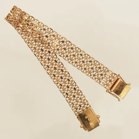 Armband X-länk med stav, längd 18cm bredd 11,8mm Guldsmedjan Täby AB 18K Vikt: 16,5 g