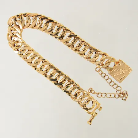 Armband Pansar längd ca 19cm bredd 11mm säkerhetskedja ostämplad bucklig/ihålig 18K Vikt: 17,1 g