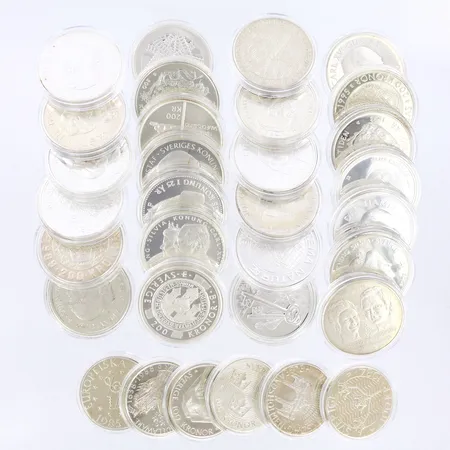 32 jubileumsmynt, med plastetui, silver 925/1000 Vikt: 798 g