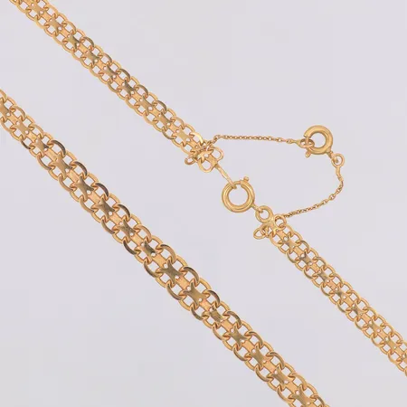 Collier doserad X-länk Segir år 1954 längd 45,5cm bredd 4,5-6,2mm, säkerhetskedja, 18K Vikt: 12,8 g