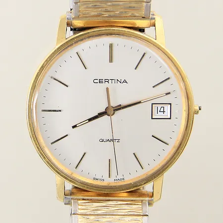 Damur Certina 18K quartz Ø34mm referensnr: EOL 115.9199.68 datum plexiglas med smärre repa flexiband i doublé på auktion i Solna hos Pantbanken Sverige