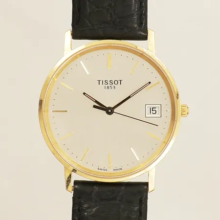 Herrur Tissot guld quartz Ø33mm 24cm inklusive boetten datum gravyr batteribyte krävs repor 18K