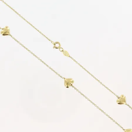 Collier med hjärtan längd 43cm, bredd 1-7mm, 18K. Vikt: 4,8 g på auktion i Malmö Triangeln hos Pantbanken Sverige