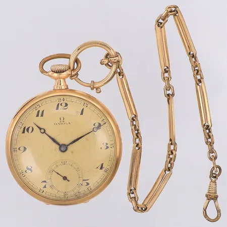 Fickur Omega Ø46mm 14K , gravyr, innerboett av metall, bruttovikt, 62,9g. Klockkedja i metall