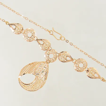 Collier Ankar med integrerade hängen med genombruten dekor längd 42cm bredd 2-25mm något bucklig 18K Vikt: 10,2 g
