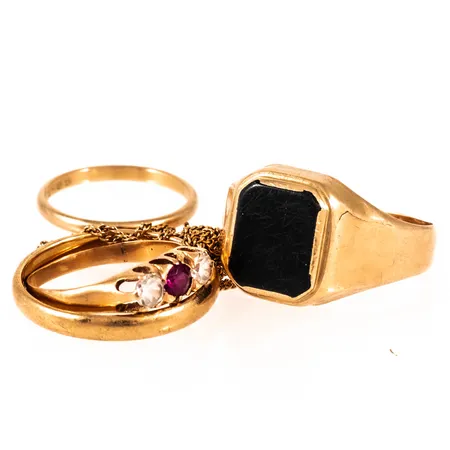 Diverse defekt/graverat guld 18K bruttovikt 15,1g.