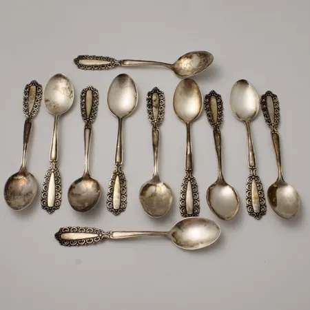 11st skedar, 11,5cm modell Carmen, silver 830/1000, Guldsmedsaktiebolaget, 115,99g.