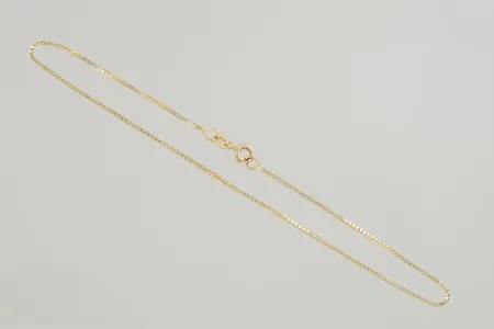 Fotlänk venezia längd 24,5 cm, 18K Vikt: 2 g på auktion i Växjö hos Pantbanken Sverige