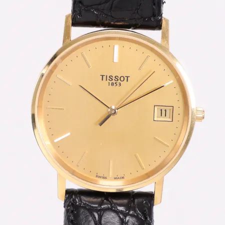 Herrur Tissot Ø33,5mm quartz datum med ask boett18K, gravyr, bruttovikt 30,3g Vikt: 0 g på auktion i Linköping hos Pantbanken Sverige
