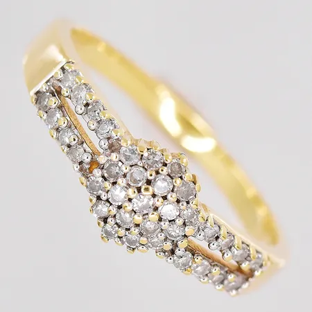 Ring diamanter 0,25ctv enligt gravyr stl:18 Guldfynd 18K Vikt: 3,5 g