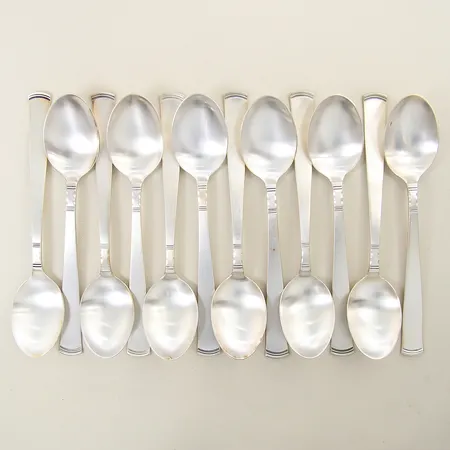 12 Dessertskedar Rosenholm GAB 15cm siver 830/1000 Vikt: 306,6 g på auktion i Solna hos Pantbanken Sverige