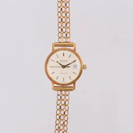 Damur Tissot Seastar quartz 18K opersonlig gravyr X-länk 17,5cm, står still, 18K. Bruttovikt 16,8g, originalbox